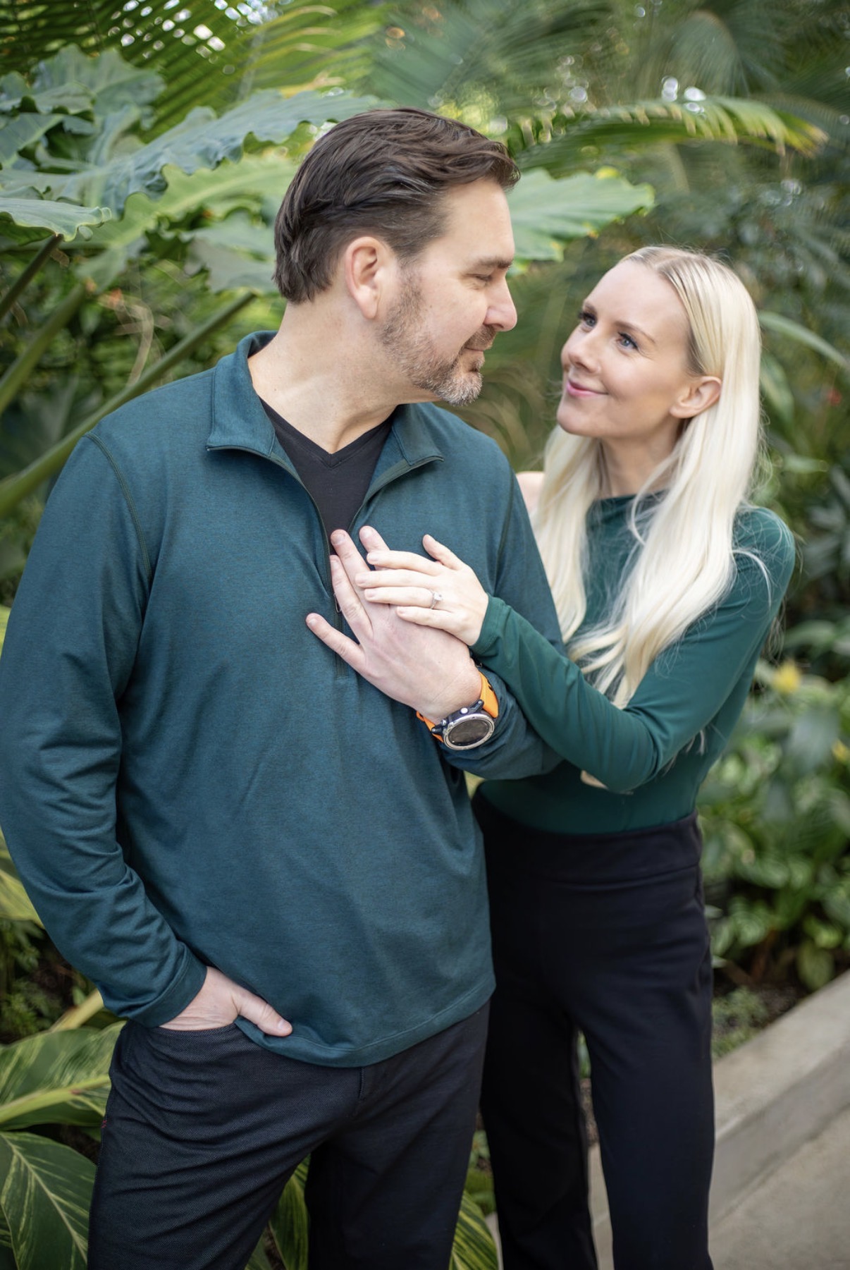 Kendra and Trevor together in a tropical greenhouse