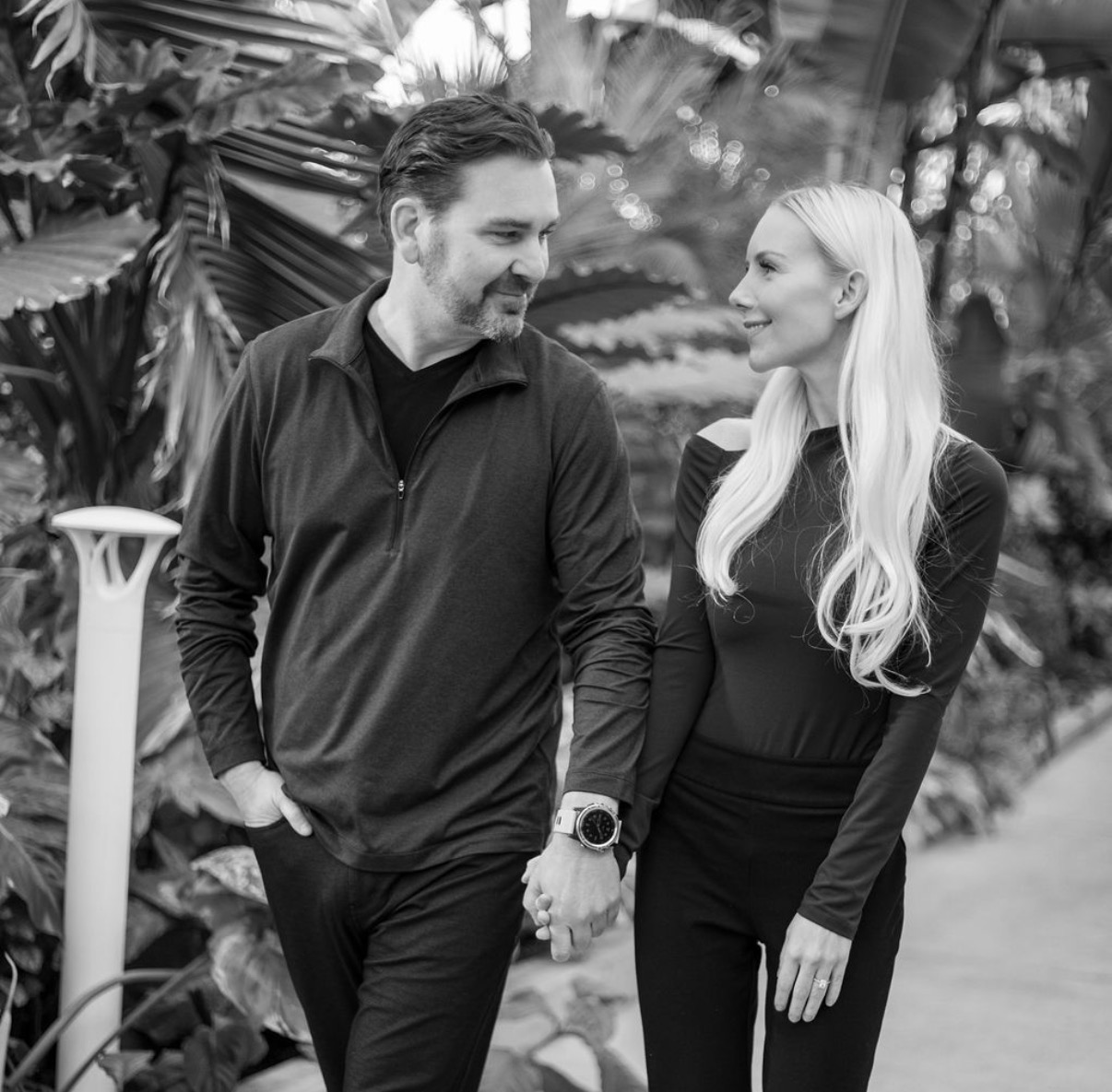 Kendra and Trevor walking hand in hand